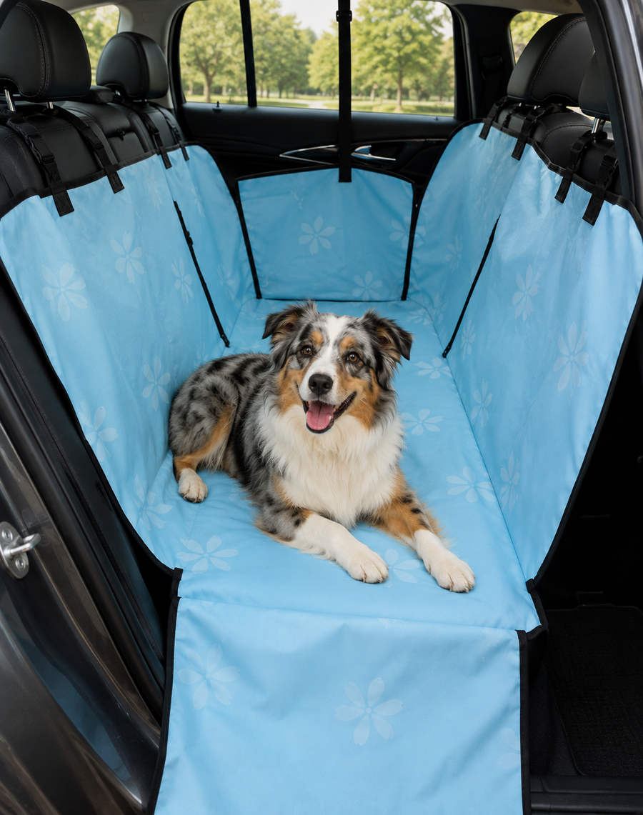 Dog resting in a blue waterproof car seat hammock